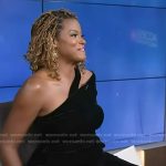 Cassandra Freeman’s black asymmeric velvet jumpsuit on Access Hollywood