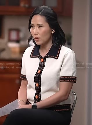Vicky’s white collared short sleeve cardigan on NBC News Daily