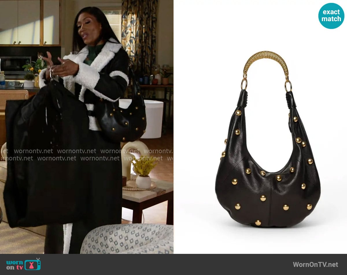 Walter Baker Miller Studded Hobo worn by Dana 'Leslie' Thomas (Trisha Mann-Grant) on Beyond the Gates