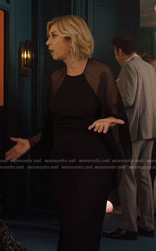 Yvette's black chiffon dress on Emily in Paris
