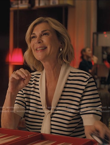 Yvette's white stripe tie neck top on Emily in Paris