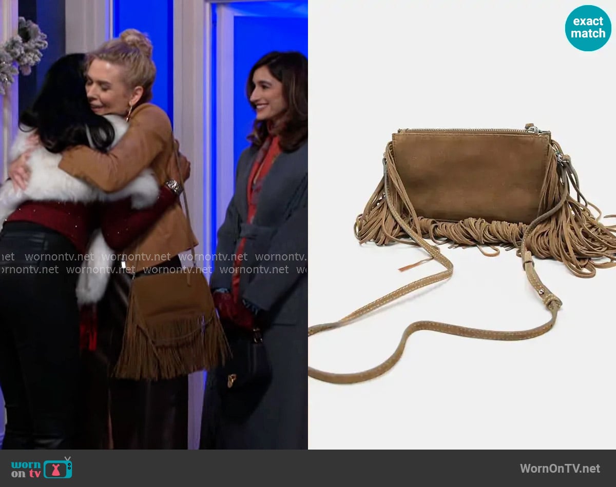 Zara Fringed Split Suede Mini Crossbody Bag worn by Jan Morgan (Jerri Tubbs) on Beyond the Gates