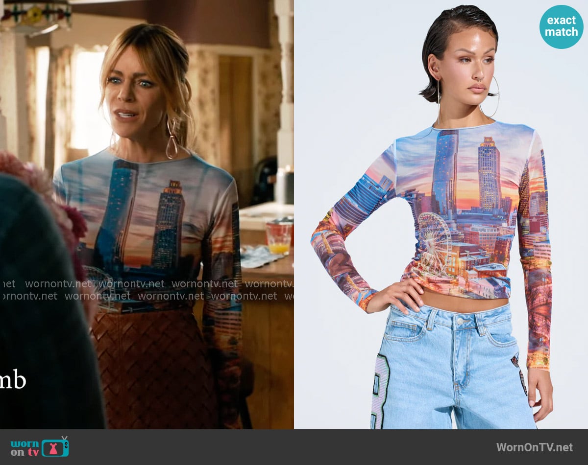 Akira City Lights Mesh Long Sleeve Top worn by Morgan Gillory (Kaitlin Olson) on High Potential