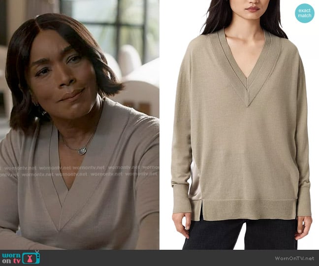 Athena’s grey v-neck sweater on 9-1-1