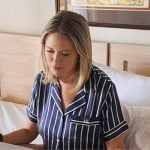 Amanda’s navy striped short pajamas on The Real Housewives of Beverly Hills