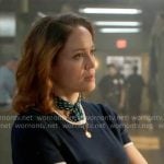 Angie’s navy short sleeve sweater with white trims on Will Trent