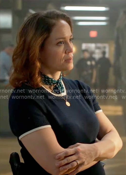 Angie’s navy short sleeve sweater with white trims on Will Trent