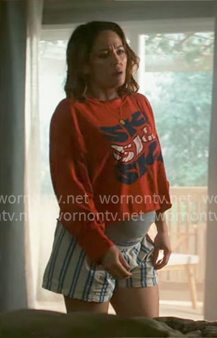 Angie’s red ski graphic tee and striped shorts on Will Trent