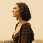 Ariana’s brown knit top and cardigan on Landman