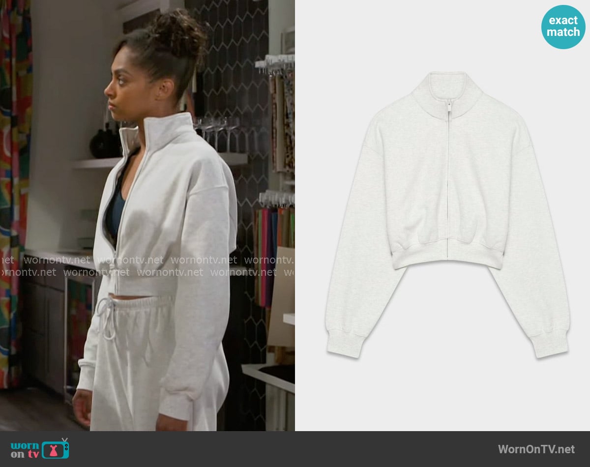 Aritzia Cozy Sweatfleece Boyfriend Mock Crop Zip-up in Heather Cloud White worn by Kat Richardson (Colby Muhammad) on Beyond the Gates