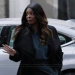 Ava’s black layered coat on Abbott Elementary