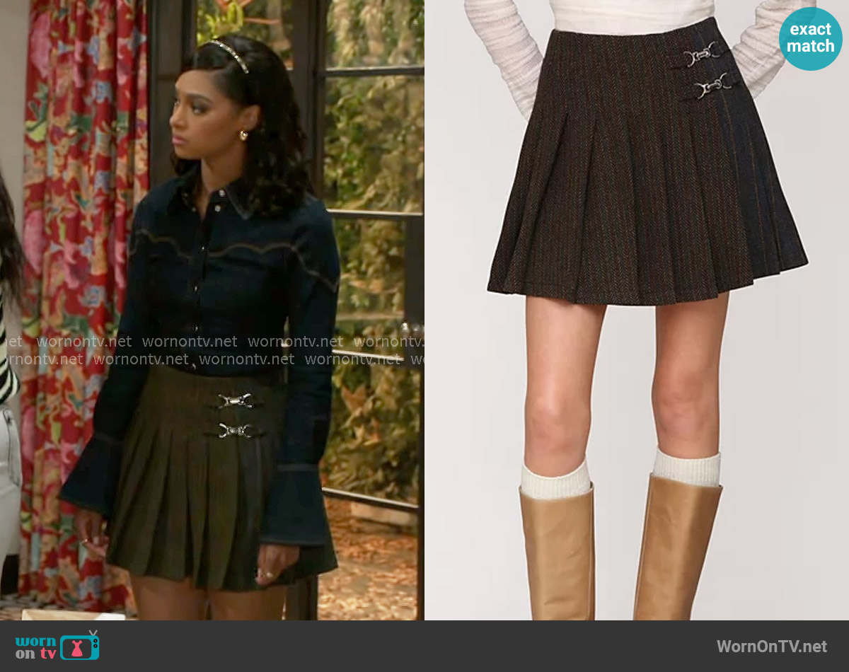 Kat’s denim shirt and pleated skirt on Beyond the Gates Kat’s denim shirt and pleated skirt on Beyond the Gates