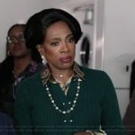 Barbara’s green pearl button cardigan on Abbott Elementary