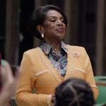 Barbara’s orange scalloped cardigan on Abbott Elementary