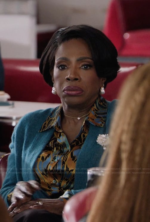 Barbara's satin feather print blouse on Abbott Elementary