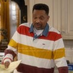 Bennie’s stripe rugby shirt with denim collar on The Upshaws