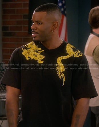 Bernard’s black dragon print tee on The Upshaws