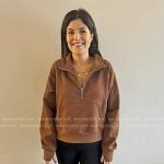 Adrianna’s brown half-zip sweatshirt on Today