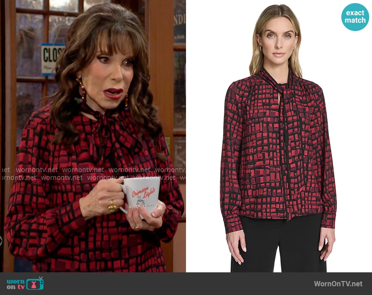 Esther’s red printed tie-neck blouse on The Young and the Restless