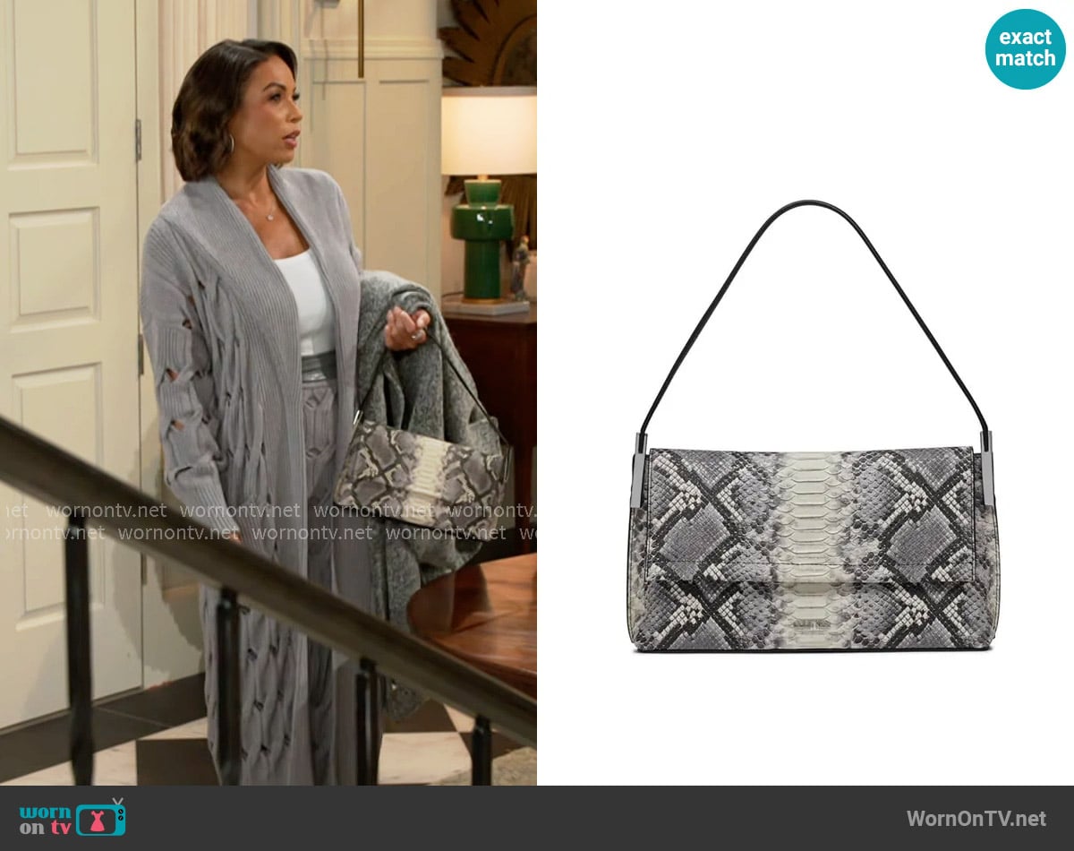 Calvin Klein Verne Flap Demi Shoulder Bag worn by Nicole Dupree Richardson (Daphnee Duplaix) on Beyond the Gates
