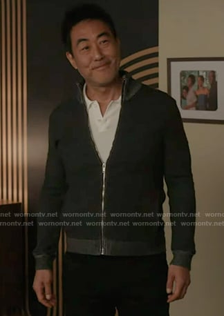 Chimney’s black zip jacket on 9-1-1