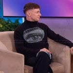 Chris Perfetti’s black eye sequin embellished sweater on The Jennifer Hudson Show