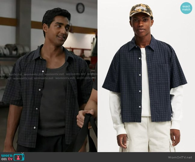 Ravi’s navy grid check short sleeve shirt on 9-1-1
