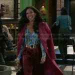 Dani’s pink coat and marbled print top on Beyond the Gates