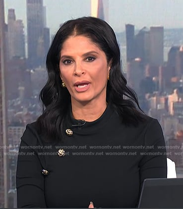 Darlene’s black button detail top on Today