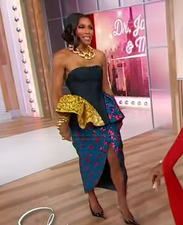 Dr Jackie’s peplum top and skirt on Sherri