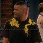 Bernard's black dragon print tee on The Upshaws