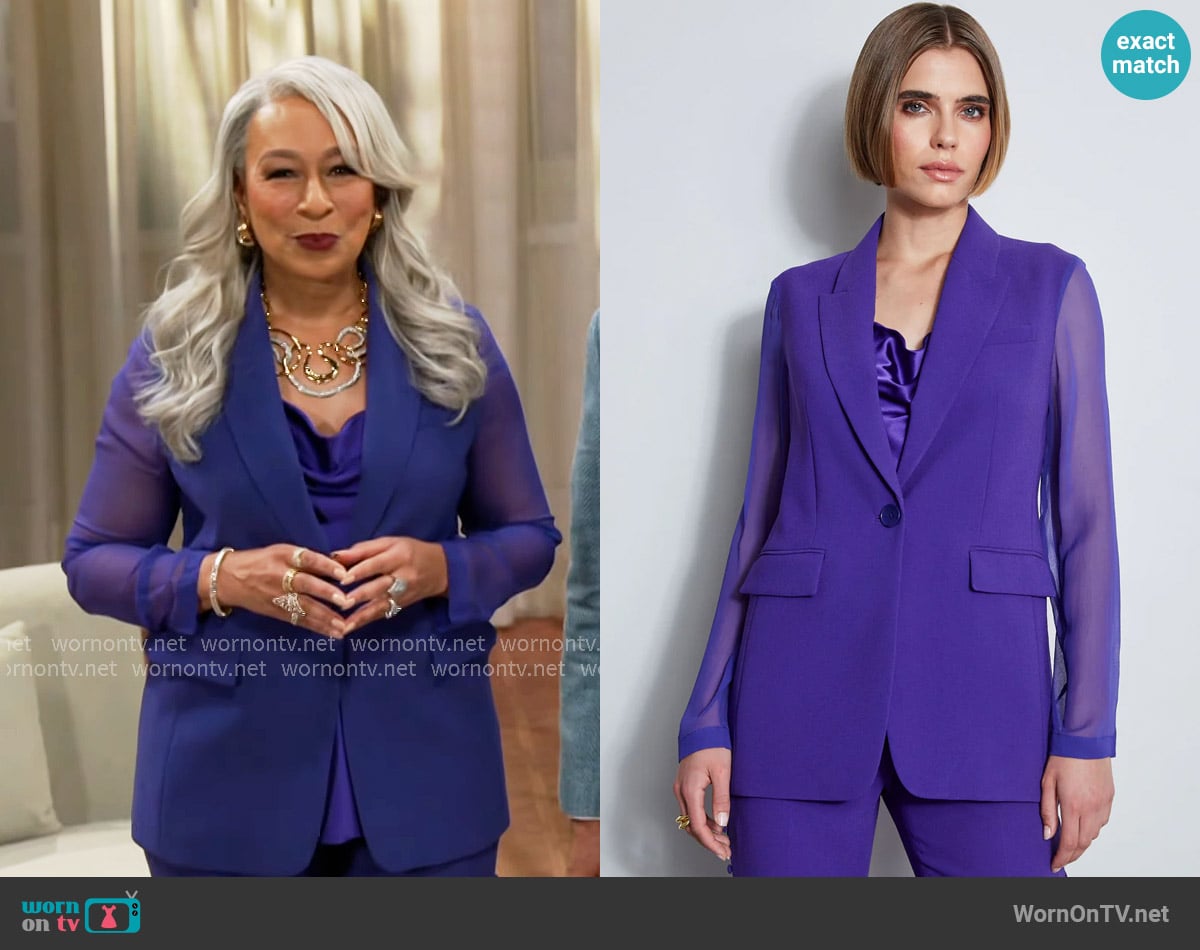 Anita’s purple sheer-sleeve blazer on Beyond the Gates