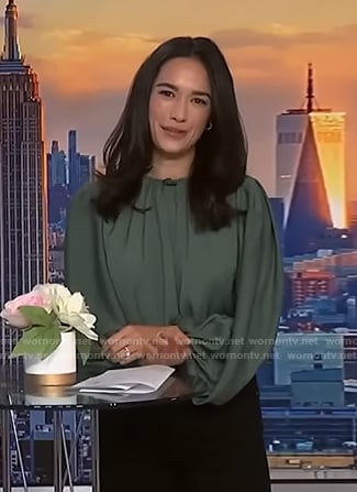 Emilie Ikeda’s green long sleeve blouse on NBC News Daily