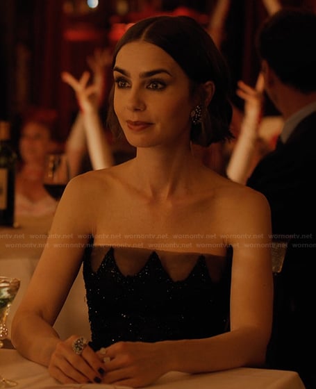 Emily's embellished earrings and rings on Emily in Paris