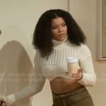 Eva’s cropped sweater and jeans on Beyond the Gates