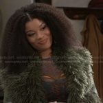 Eva's green fur collar coat on Beyond the Gates