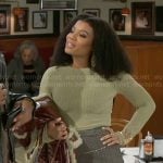 Eva’s green pointelle knit sweater and printed skirt on Beyond the Gates