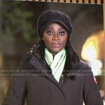 Faith Abubey’s black belted down jacket coat on Good Morning America