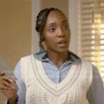 Faith’s cable-knit sweater vest and blue embroidered collar shirt on Will Trent