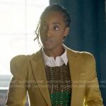 Faith’s yellow puff-sleeve blazer and striped knit tank top on Will Trent