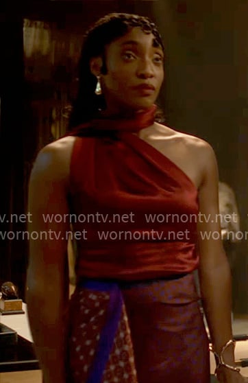 Faith's red one-shoulder top and printed skirt on Will Trent