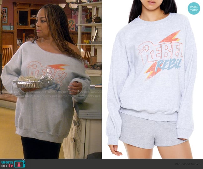 Forever 21 Rebel Rebel Fleece Pullover worn by Regina Upshaw (Kim Fields) on The Upshaws