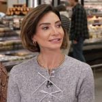 Courtney Lopez’s gray cardigan on Access Hollywood