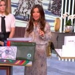 Gretta Monahan’s metallic floral blouse and pleated skirt on The View