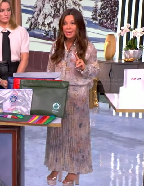 Gretta Monahan’s metallic floral blouse and pleated skirt on The View