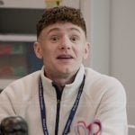 Jacob's white fleece jacket on Abbott Elementary