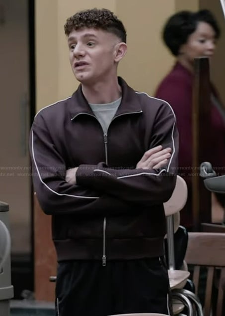 Jacob's burgundy piping jacket on Abbott Elementary