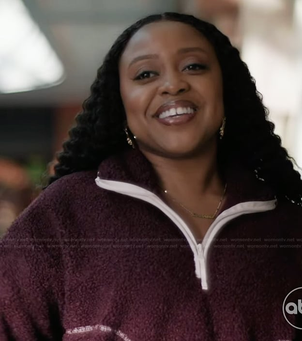 Janine’s burgundy sherpa jacket on Abbott Elementary