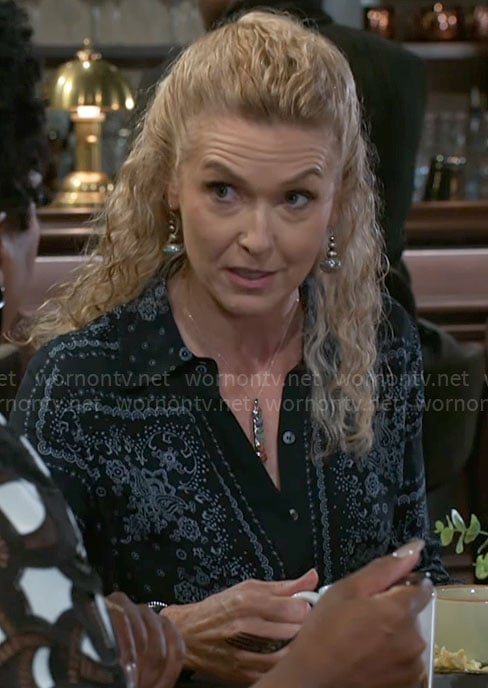 Jan’s navy printed shirt on Beyond the Gates