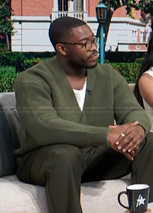 Jarrett Austin Brown’s green cardigan on Access Hollywood